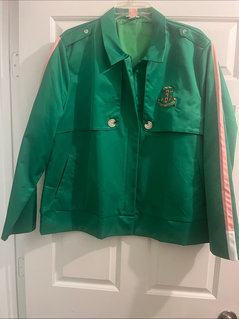 Green Bomber Jacket with Pink Stripe and Crest Patch